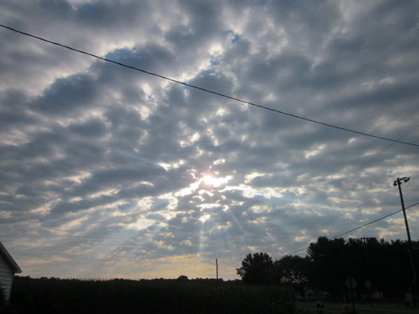 sun breaking through clouds